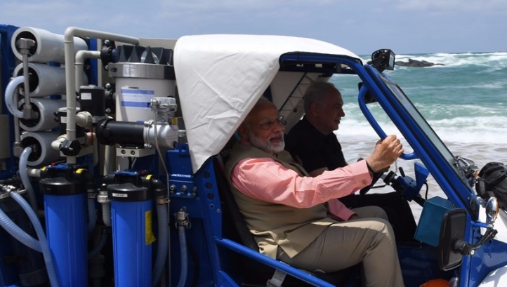 India's prime minister Narendra Modi (left), and Israeli prime minister Benjamin Netanyahu, aboard a Galmobile desalination unit on Olga Beach, Israel